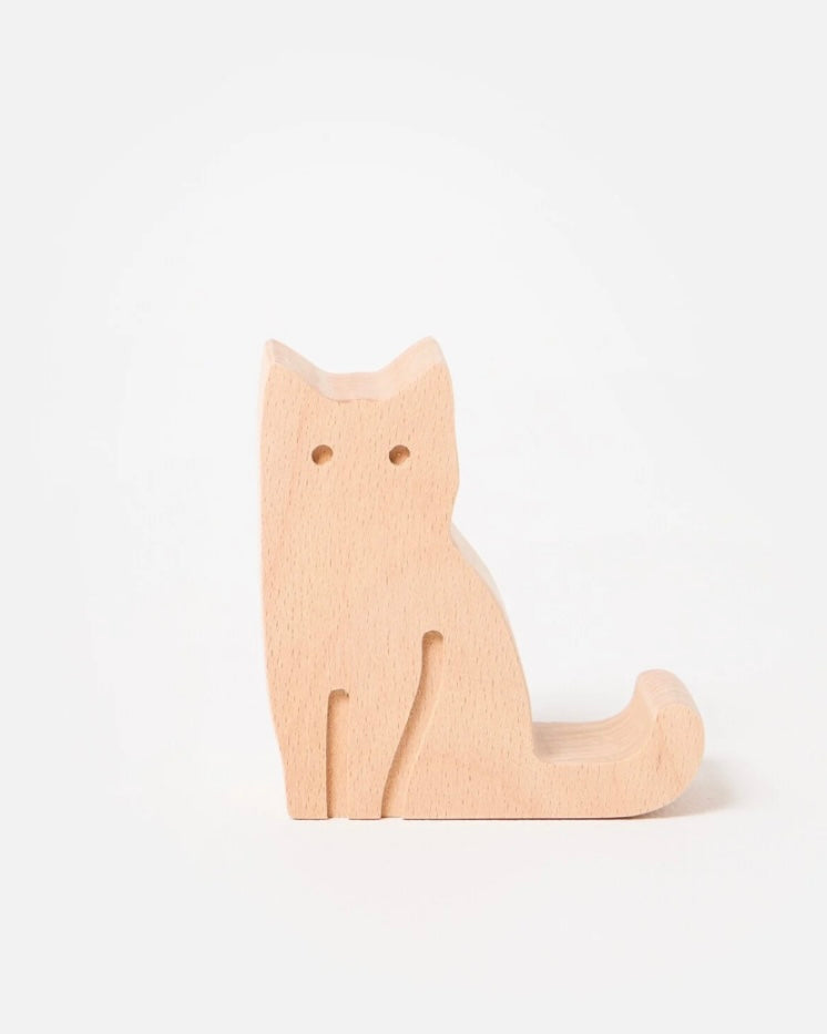 Wooden cat shaped mobile phone holder on a white background