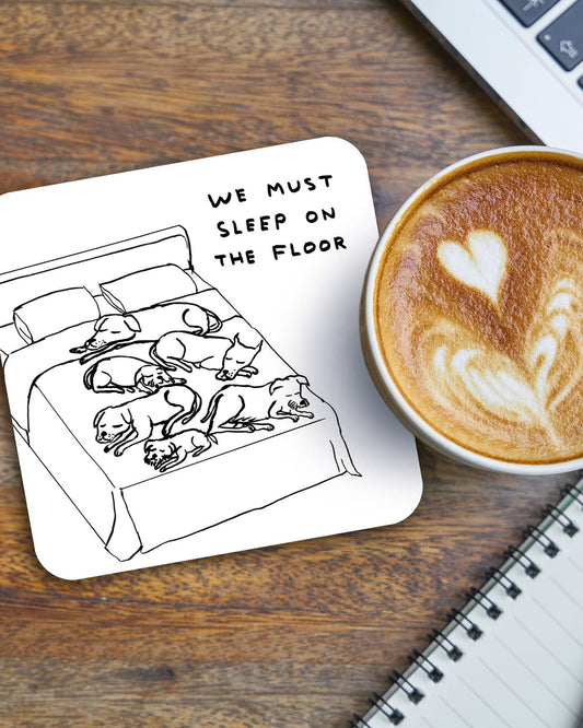 Sleep On the Floor Coaster by David Shrigley