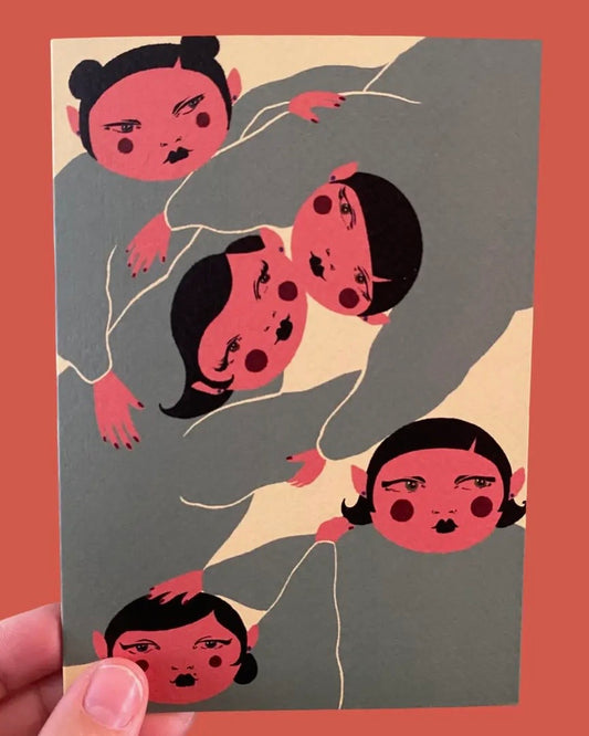 ‘Tussle’ Illustration of multiple heads with black hair and red skin on a gray background, held against an orange background.