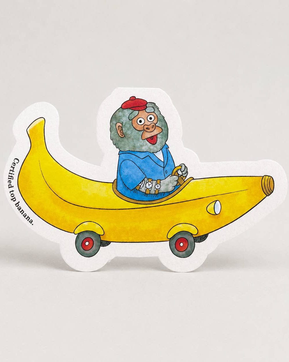 Cartoon character by Richard Scarry driving a banana-shaped car on a white background